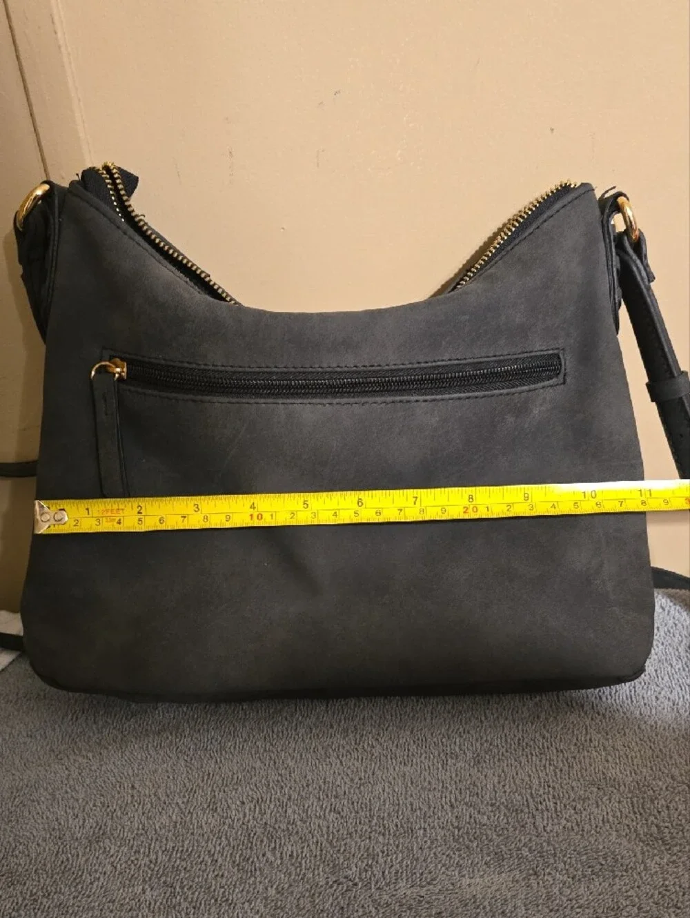 Rosetti Black Suede Drawstring Crossbody Bag with Gold Hardware